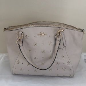 Coach bag with gold design